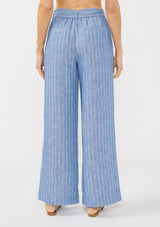 [Color: Blue] A back facing image of a model wearing a blue striped bottom with a belt, elastic waist, and side pockets. 