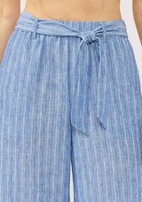 [Color: Blue] A detail image of a model wearing a blue striped bottom with a belt, elastic waist, and side pockets. 