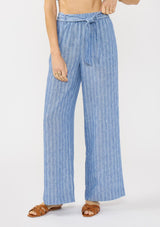 [Color: Blue] A front facing image of a model wearing a blue striped bottom with a belt, elastic waist, and side pockets. 