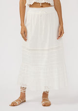 [Color: White] A front facing image of a white bohemian maxi skirt with an eyelet trim, pintucks, and an elastic drawstring waist. 