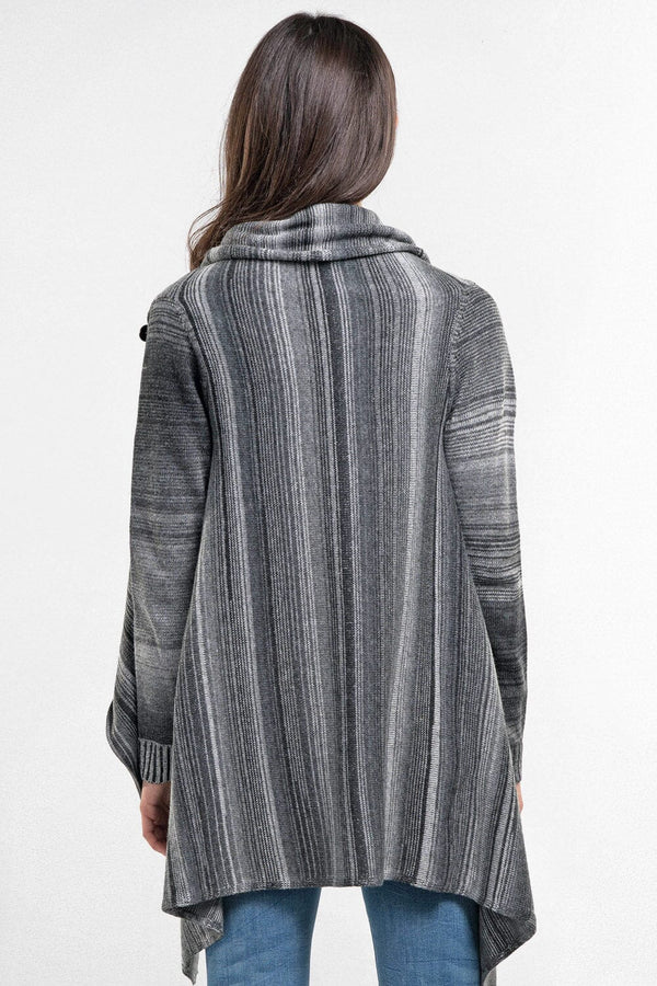 [Color: Heather Grey/Black] An image of a model wearing a striped shawl cardigan with a fringe trim and wrap button closure. 