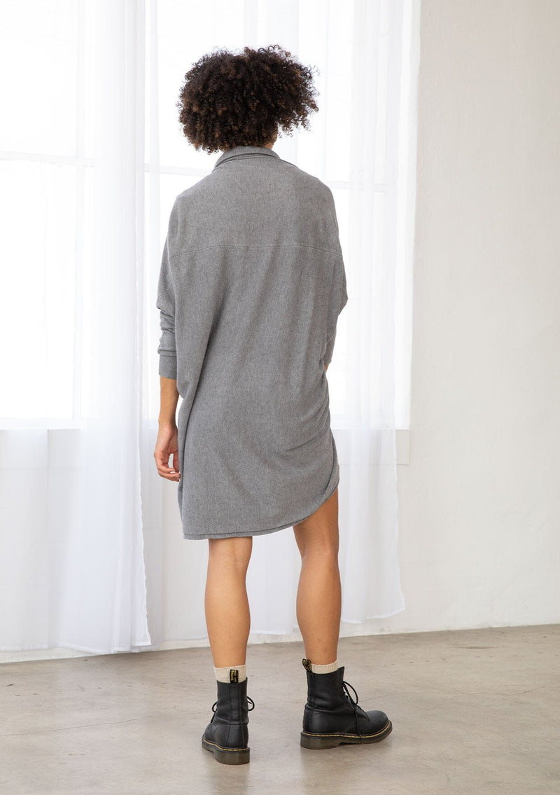 [Color: Heather Charcoal] A brunette model wearing a slouchy cardigan with a cocoon fit, shawl collar drape, and long dolman sleeves. This relaxed style is the perfect casual staple for any fall wardrobe. 