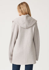 [Color: Heather Grey] A back facing image of a blonde model wearing an oversized sweater coat in heather grey. With an oversized hood, long sleeves, an open front, side pockets, and a mid length. 