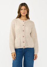 [Color: Heather Taupe] A front facing image of a brunette model wearing a beige cardigan with a button front and crew neckline. 