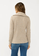 [Color: Heather Cement] A back facing image of a brunette model wearing a brown pointelle knit sweater with a half zip up. 