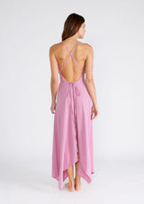 [Color: Orchid] A sexy strappy light purple halter dress in airy cotton gauze. With a plunging v neckline, handkerchief hemline, and long straps that can be tied in multiple ways.