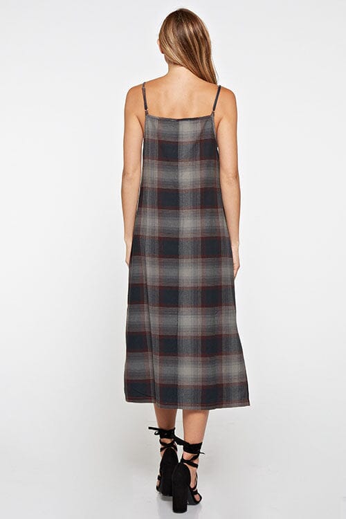 [Color: Dark Grey] Throw it back to the nineties with our effortlessly chic and easy plaid midi dress. Made from one hundred percent cotton, this tank top dress features a flattering v neckline with front button detail and breezy side slits for movement. Styled here with black heels.