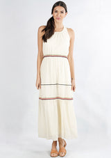 [Color: Natural/Multi] A front facing image of a brunette model wearing an off white sleeveless maxi dress with embroidered accents. 
