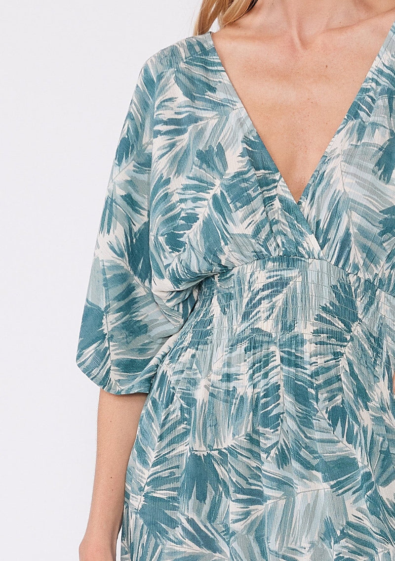 [Color: Natural/Green] Relaxed fit bohemian mini dress with half length sleeves, deep v neckline, and a green and white abstract palm leaf print. The perfect lightweight billowy summer mini dress.
