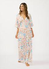 [Color: Ivory/Orange] A front facing image of a brunette model wearing a blue and orange kimono sleeve maxi dress with a deep v neckline, smocked waist, tie back detail, and side slits. 