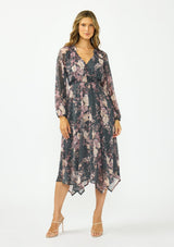 [Color: Grey/Dusty Rose] A front facing image of a brunette model wearing a grey floral handkerchief dress with clipped lurex, a surplice v neckline, long sleeves, and an elastic waist. 