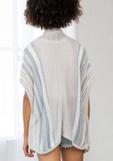 [Color: Silver/Blue] A back facing image of a brunette model wearing a lightweight striped cardigan with open knit details, short dolman sleeves, and side button closure. An effortless layer for warm weather days. 