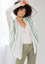 [Color: Silver/Green] A front facing image of a brunette model wearing a lightweight striped cardigan with open knit details, short dolman sleeves, and side button closure. An effortless layer for warm weather days. 