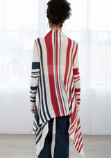 [Color: Ivory/Red/Blue] A brunette model wearing a red white and blue striped cardigan with a waterfall open front and long sleeves. A cozy light layer for casual outfits. 