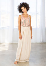 [Color: Natural/Olive/Coral] A front facing image of a brunette model wearing a beige sleeveless maxi dress with a coral embroidered bodice and a scoop neckline. 