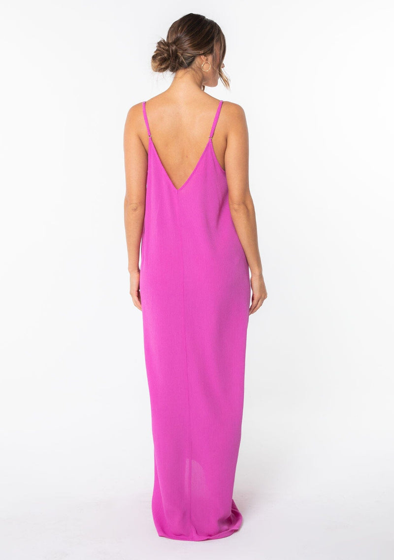 [Color: Purple] A bright purple harem maxi dress. This billowy maxi tank top dress features a deep v neckline, adjustable spaghetti straps, and a cocoon fit.