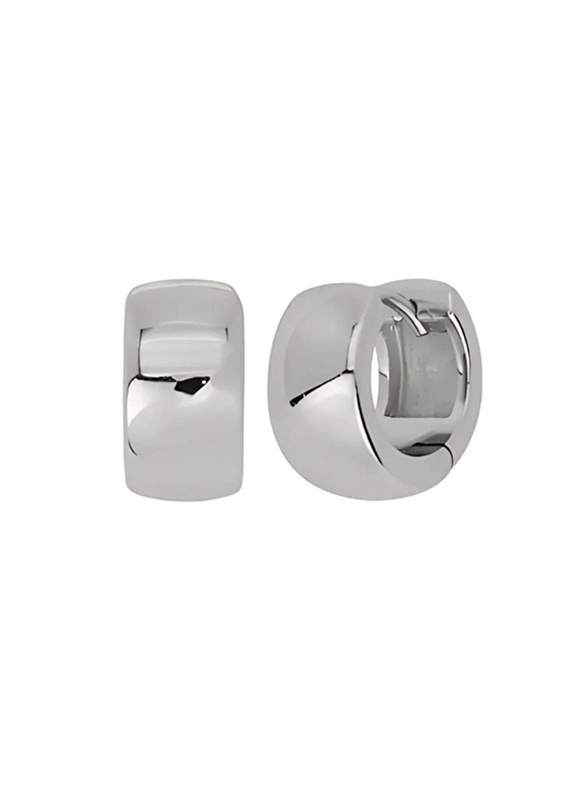Pair of silver hoop huggie earrings on a white background