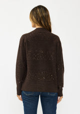 [Color: Brown] A back facing image of a brunette model wearing a brown open front cardigan with sequins and rib trims. 