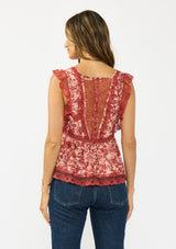 [Color: Wine/Dusty Rose] A back facing image of a brunette model wearing a wine floral print lace top with cap sleeves, v neckline, and a back button closure. 