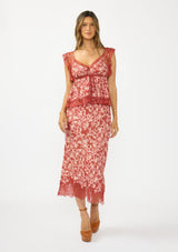 [Color: Wine/Dusty Rose] A front facing image of a red and white midi skirt with lace trim. Styled with a matching lace trim top and brown platform heels.