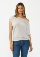 [Color: Light Heather Grey] A front facing image a brunette model wearing an off the shoulder sweater top with short sleeves and a fitted ribbed hem. 