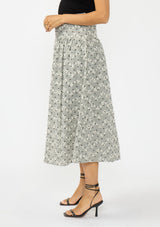 [Color: Black] A side facing image of an black and white embroidered checkered  midi skirt with a side zipper. 