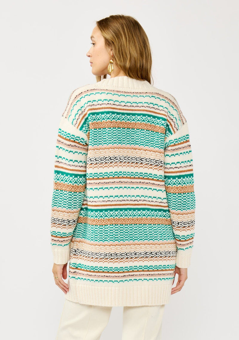 [Color: White/Green] A back facing image of a blonde model wearing a green and brown striped knit cardigan with a contrasting ribbed trim. Featuring long cozy sleeves and an open front for easy layering. A boho inspired cardigan for the fall season. 
