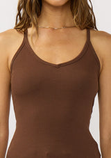 [Color: Chocolate] A detail image of a brunette model wearing a brown micro ribbed tank top with a v-neckline and racerback. A basic everyday tank top 