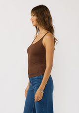 [Color: Chocolate] A side facing image of a brunette model wearing a brown micro ribbed tank top with a v-neckline and racerback. A basic everyday tank top 