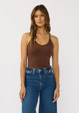 [Color: Chocolate] A brunette model wearing a brown micro ribbed tank top with a v-neckline and racerback. A basic everyday tank top 