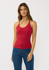 [Color: Wine Red] A front facing image of a brunette model wearing a red micro ribbed tank top with a v-neckline and racerback. A basic everyday tank top.