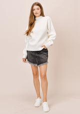 [Color: Charcoal] A blonde model wearing a white sweater with an elegant funnel neck, a concealed zip closure at the back neck, and contrast ribbed details. A basic cold weather sweater for the fall season. 