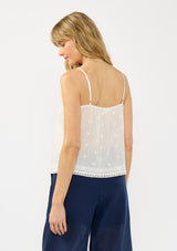 [Color: White] A back facing image of a blonde model wearing a white lace camisole with a square neckline, embroidered details, and adjustable spaghetti straps. 