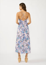 [Color: Natural/Dusty Rose] A back facing image of a brunette model wearing a pink and blue floral maxi with a deep v neckline, spaghetti straps, a cross back, and front slits. 