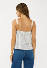 [Color: Natural/Blue] A back facing image of a brunette model wearing a blue and white bohemian tank top with a square neckline and adjustable straps with lace trim.