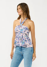 [Color: Natural/Dusty Rose] A side facing image of brunette model wearing a tropical pink and blue halter top with a gathered bust and smocked back. 