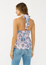 [Color: Natural/Dusty Rose] A back facing image of brunette model wearing a tropical pink and blue halter top with a gathered bust and smocked back. 