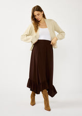 [Color: Heather Natural] A front facing image of a blonde model wearing a casual, lightweight cardigan with an open front, ribbed trim, and rolled edges. A classic staple cardigan for transitional styling. 