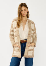 [Color: Tan/Mocha] A front facing image of a blonde model wearing a brown plaid cardigan with cozy long sleeves and an open front. A warm fuzzy sweater for the fall season. 