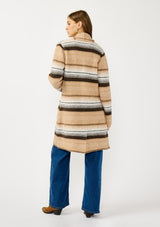 [Color: Camel/Brown] A back facing image of a blonde model wearing a brown and tan striped mid length coatigan with a shawl collar, button front, and side patch pockets. Effortlessly cozy for the fall and winter season. 