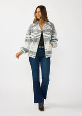 [Color: Grey/Cream] A front facing image of a brunette model wearing a soft and fuzzy grey plaid bomber jacket with a collared neckline, button front, and side pockets. 