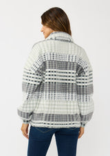 [Color: Grey/Cream] A back facing image of a brunette model wearing a soft and fuzzy grey plaid bomber jacket with a collared neckline, button front, and side pockets. 