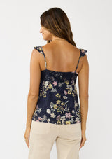 [Color: Navy/Yellow] A back facing image a navy floral top with burnout details. Featuring an adjustable straps with ruffle detail, a scoop neckline with tie detail, and lace trim. A feminine and romantic top for the fall season. 