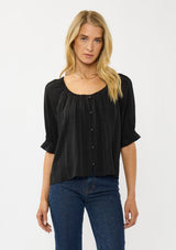 [Color: Black] A front facing image of a blonde model wearing a plaid chiffon top with puff sleeves, a scoop neckline, and button front. 