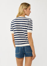 [Color: Cream/Navy] A back facing image of a blonde model wearing a navy striped sweater top with short sleeves and a split v-neckline. A lightweight layer for resort season. 
