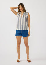 [Color: Blue/White] A front facing image of a brunette model wearing a blue cotton striped top with a smoked yoke, a split v-neckline, and ruffled cap sleeves. 