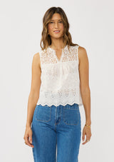 [Color: White] A front facing image of a brunette model wearing a white tank top with lace and eyelet detailing. 