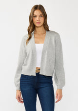 [Color: Heather Grey] A front facing image of a brunette model wearing an grey cardigan with a collarless design, floral embroidery, and rib trims. 