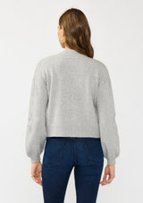 [Color: Heather Grey] A back facing image of a brunette model wearing an grey cardigan with a collarless design, floral embroidery, and rib trims. 