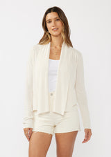[Color: Vanilla] A front facing image of a linene blend classix cardigan with an open front, shawl collar, an
